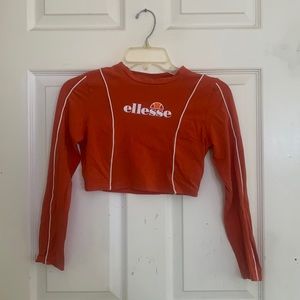 orange cropped long-sleeve ellesse top